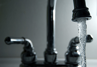 Water pouring from faucet